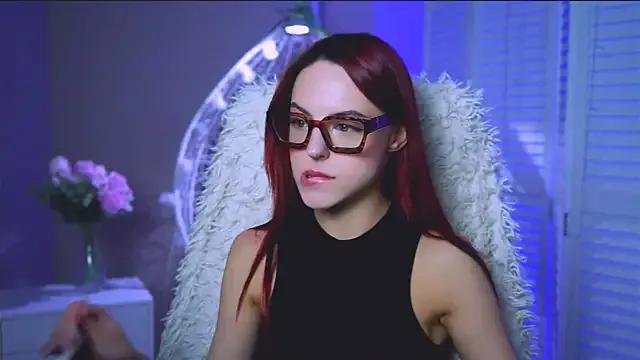 StripChat evanellson is Freechat evanellson — try on a red dress